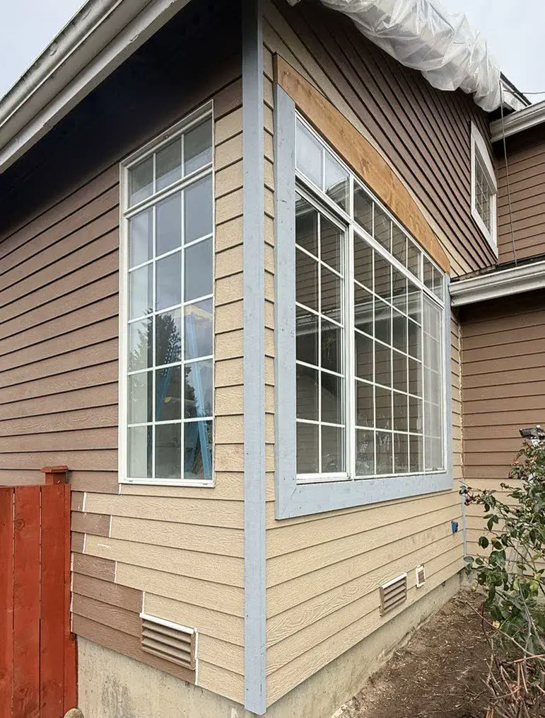 After: Siding corner repaired and painted