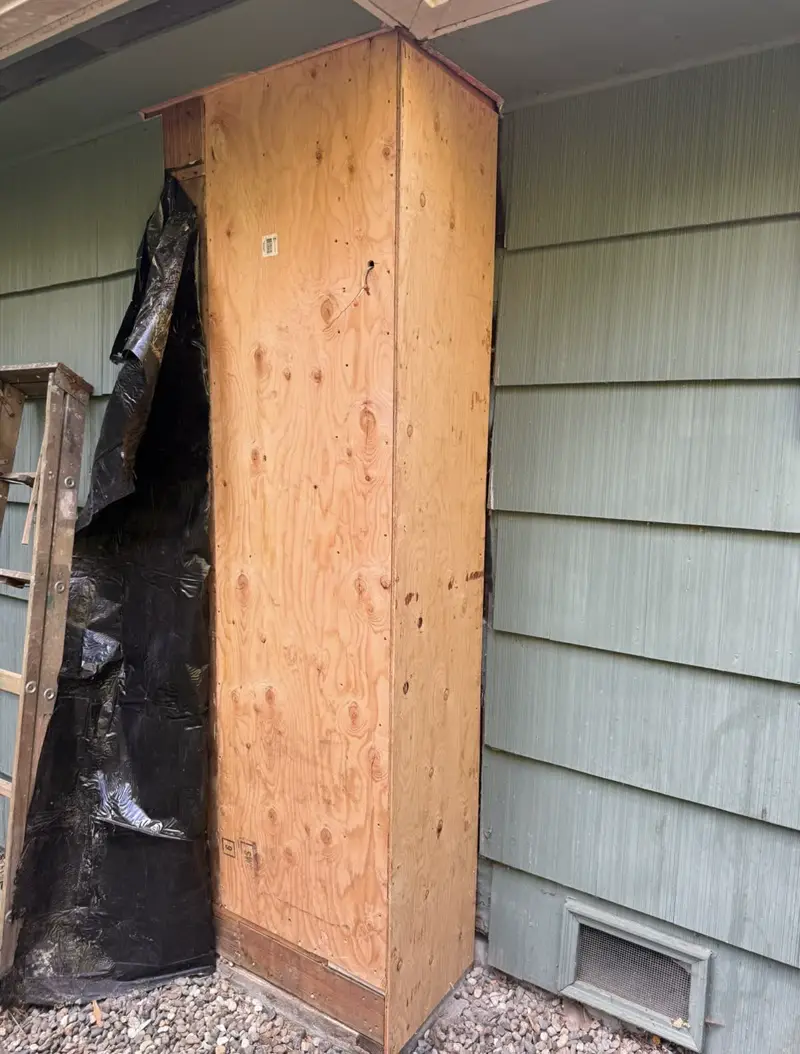 Chimney chase rebuilt with new sheathing